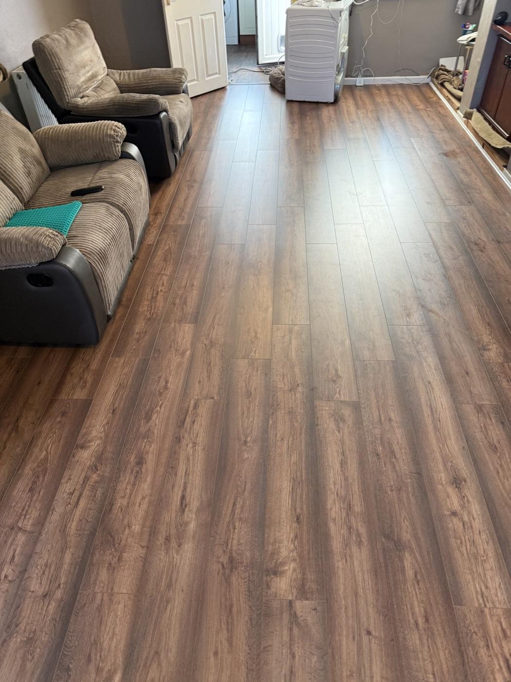 After: the floor running the full length of the room