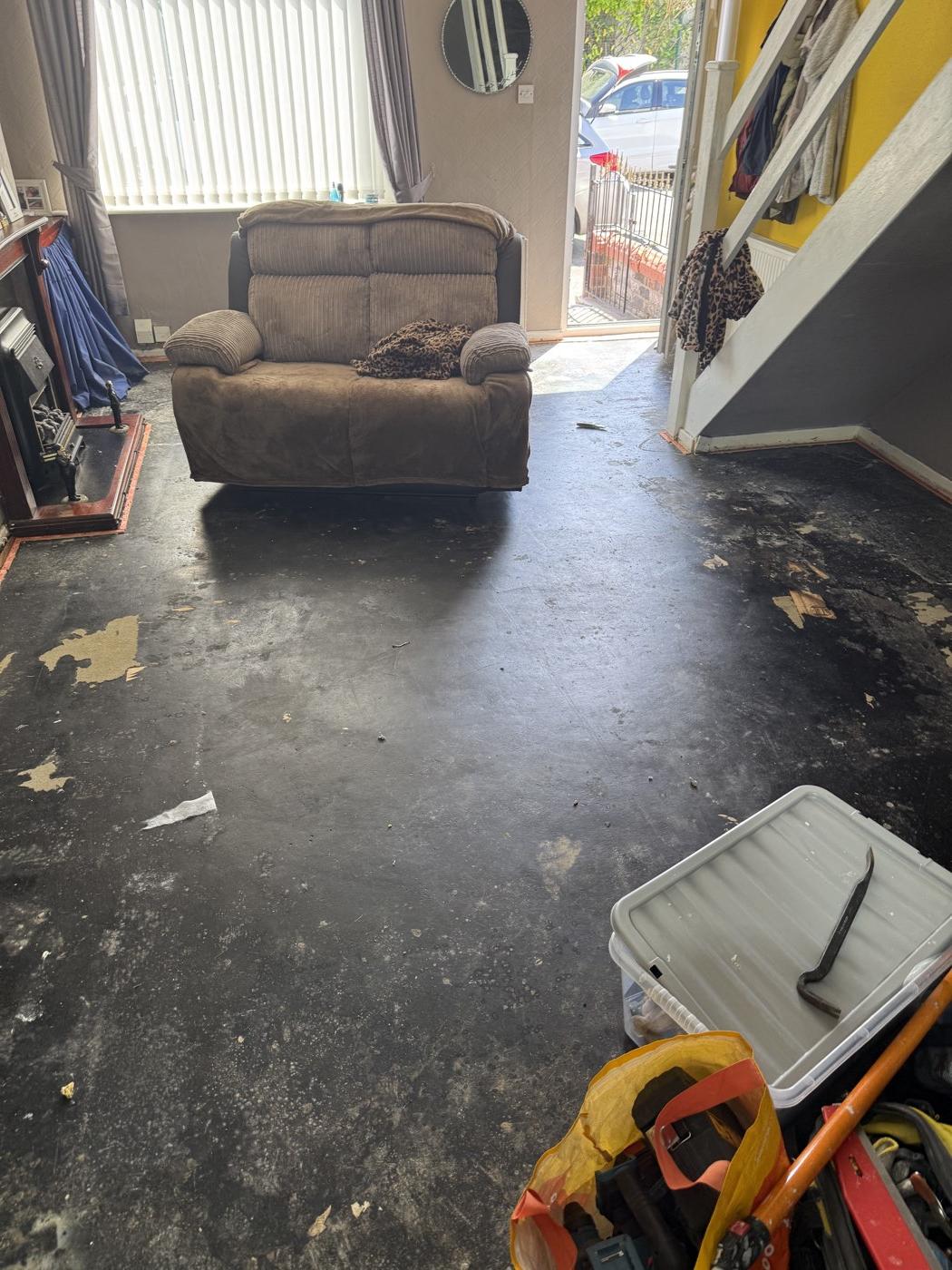 The old carpet lifted and the floor cleared
