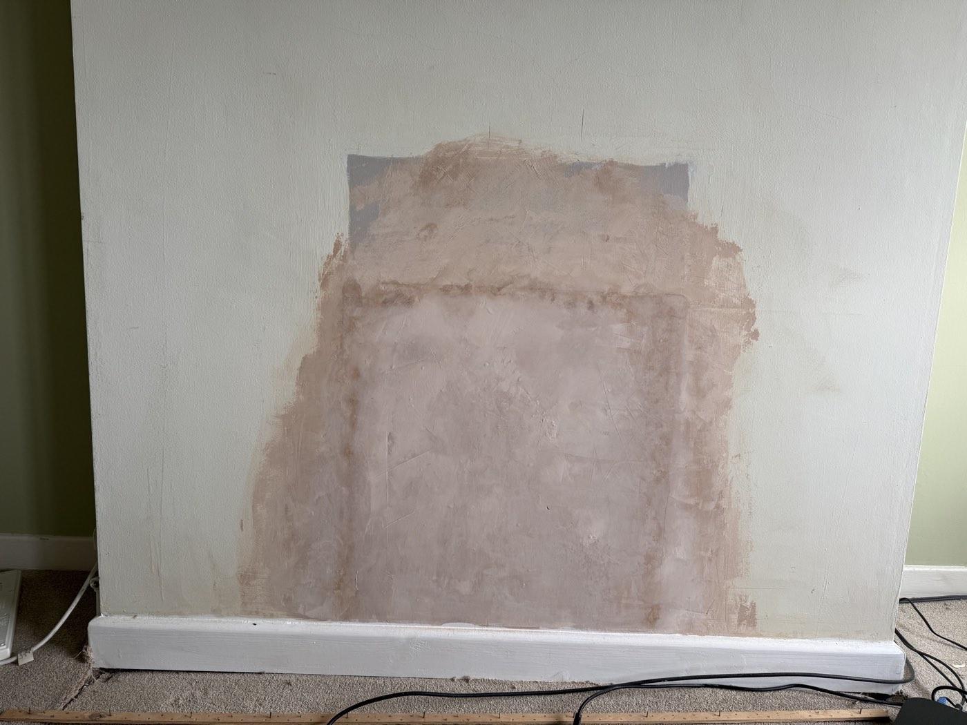 Repairs: damaged plaster patched before decorating
