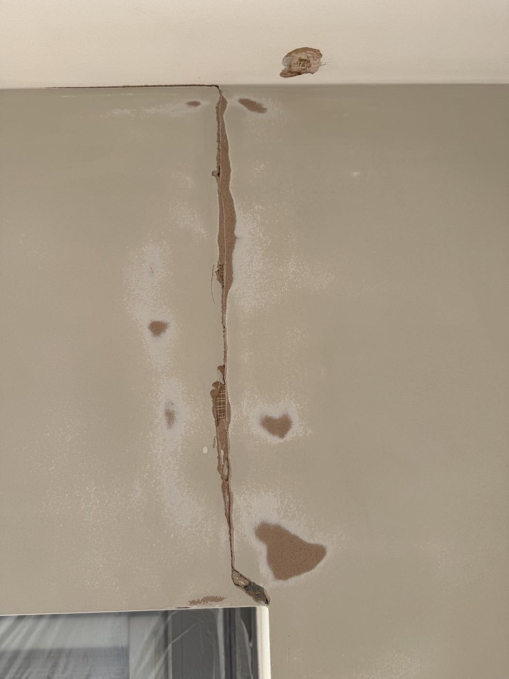 Repairs: a cracked joint raked out and filled before painting