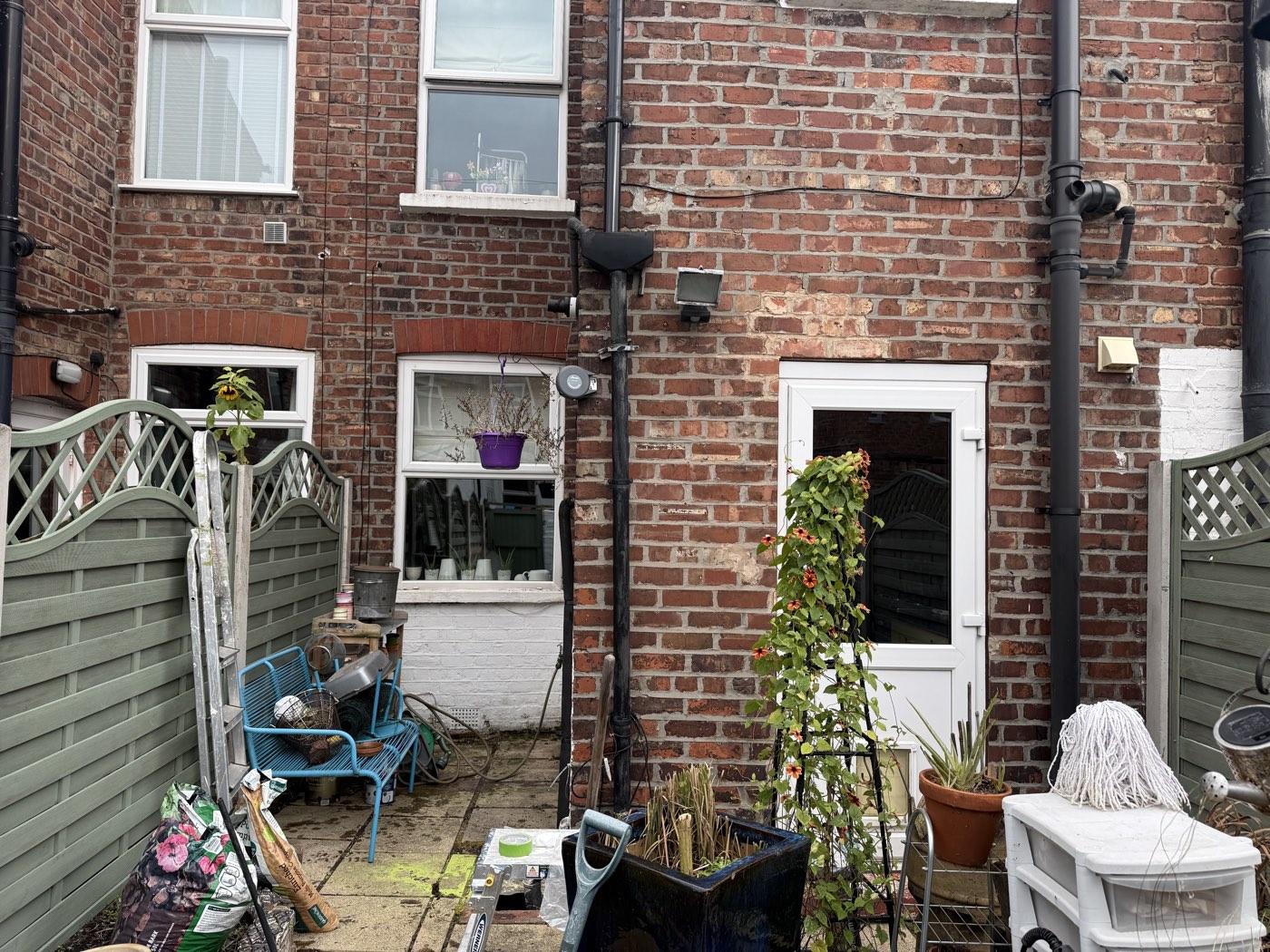 Before: the bare brickwork