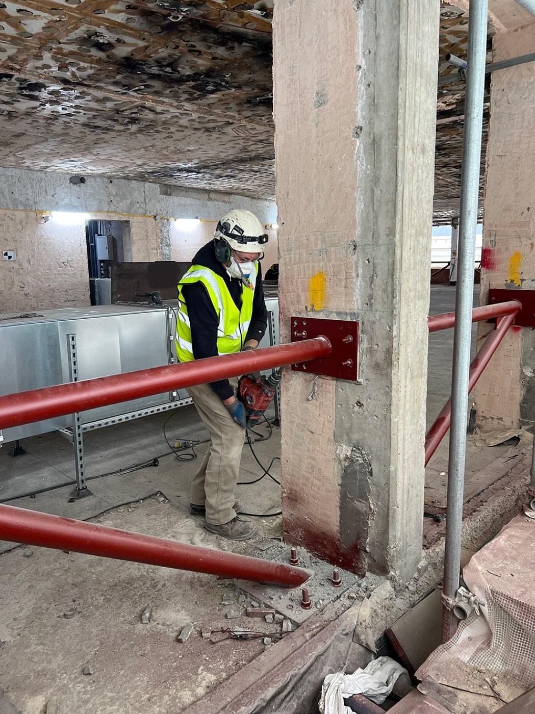 On site: drilling and fixing a connection plate